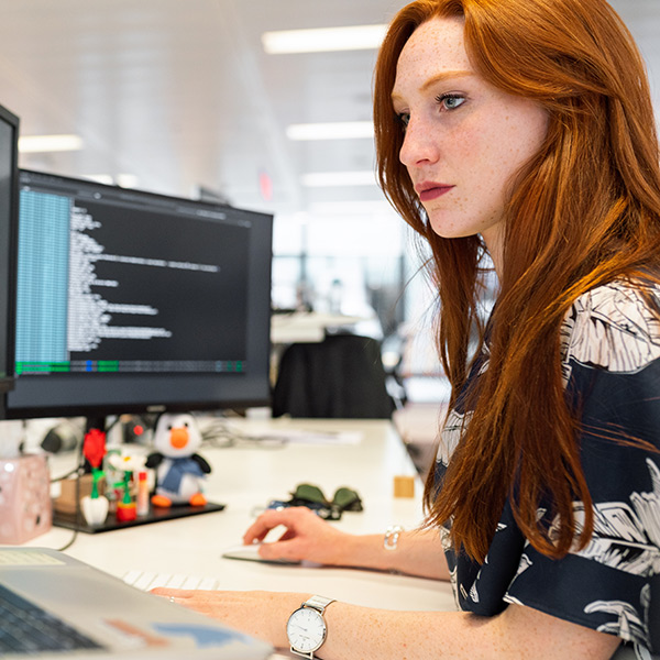 a woman working at her desk