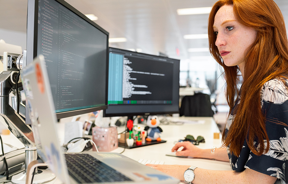 a woman working at her desk